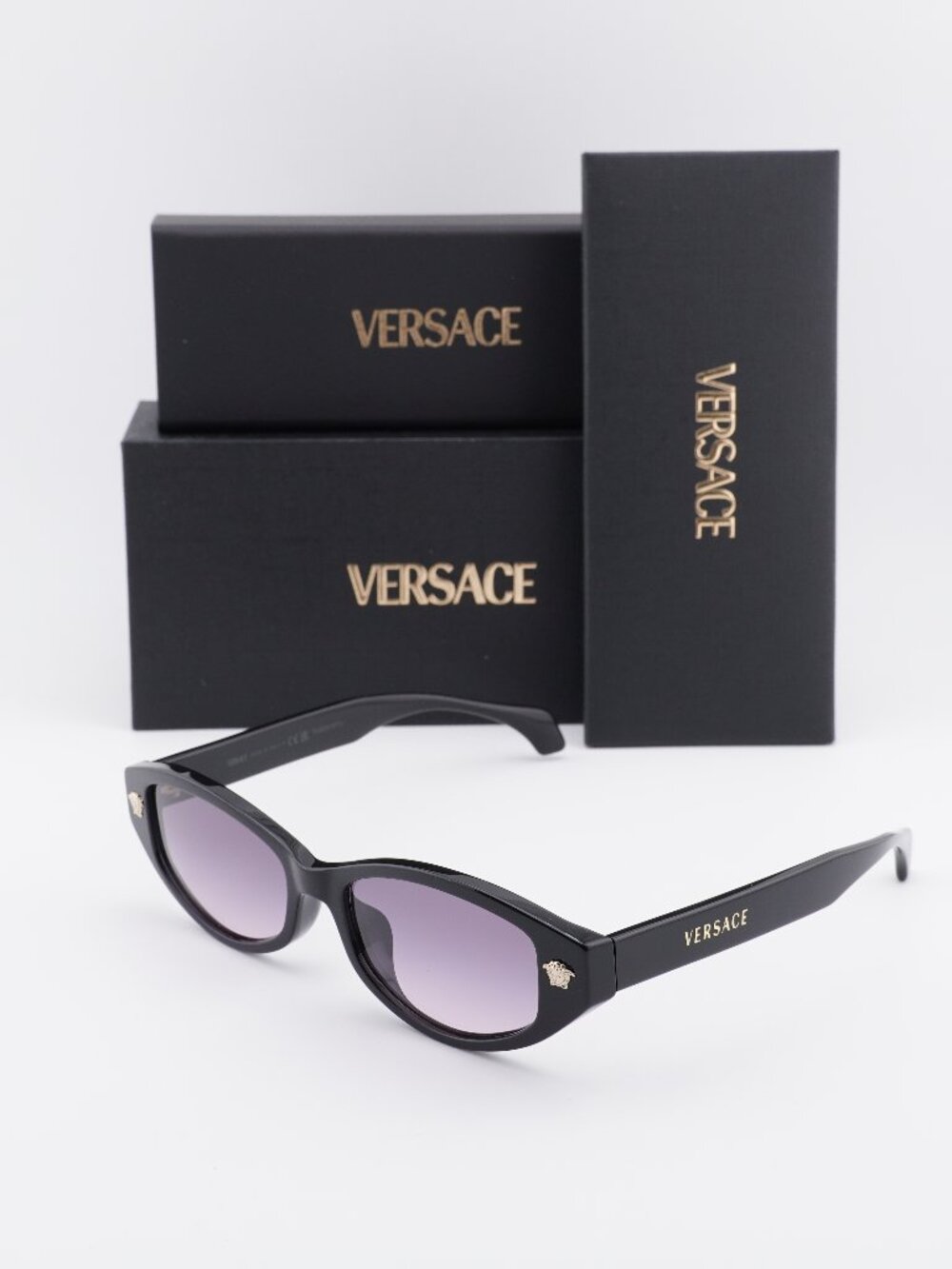 Versace VE4512D GB1/5M Oval Sunglasses – Black / Rose Gradient Grey